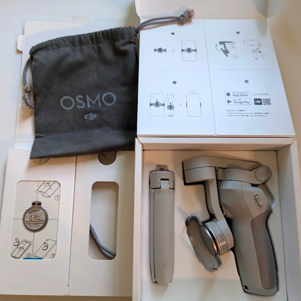 DJI OM 4 Smartphone Gimbal Stabilizer with Case & Manuals